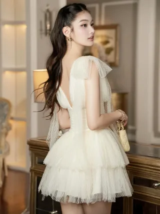 Photo 3 of Váy ngắn voan kem Chouchou tay cánh tiên