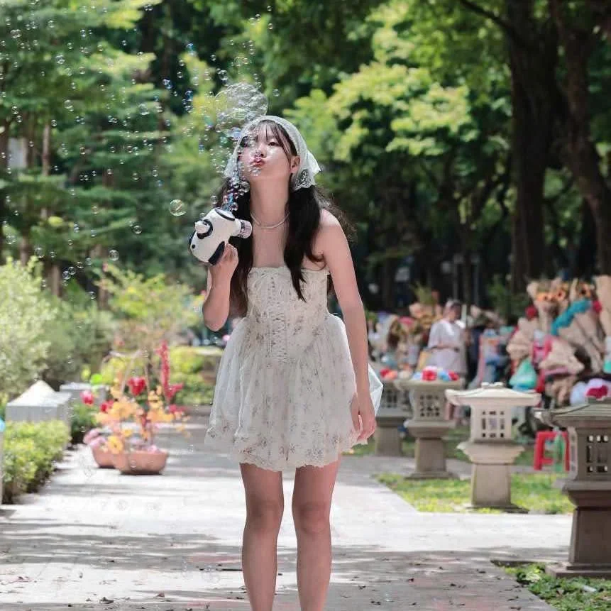 Photo 4 of Đầm ren trắng mini hottrend nữ