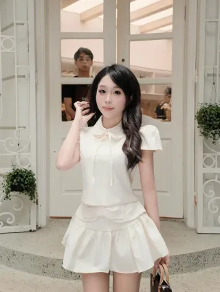Photo 3 of Set áo váy trắng tay phồng nữ