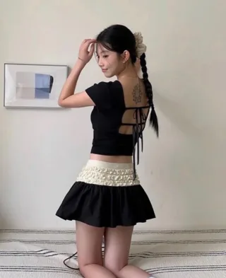Photo 1 of Set croptop đen chân váy nhún nữ size S