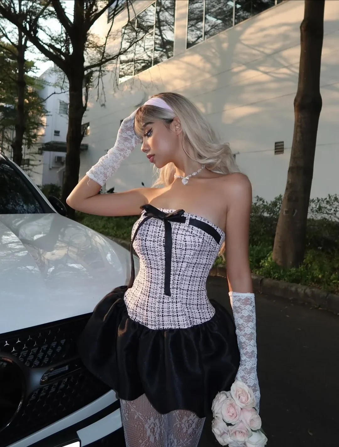 Photo 4 of Set Corset Tweed Hồng Chân Váy Satin Đen Nữ