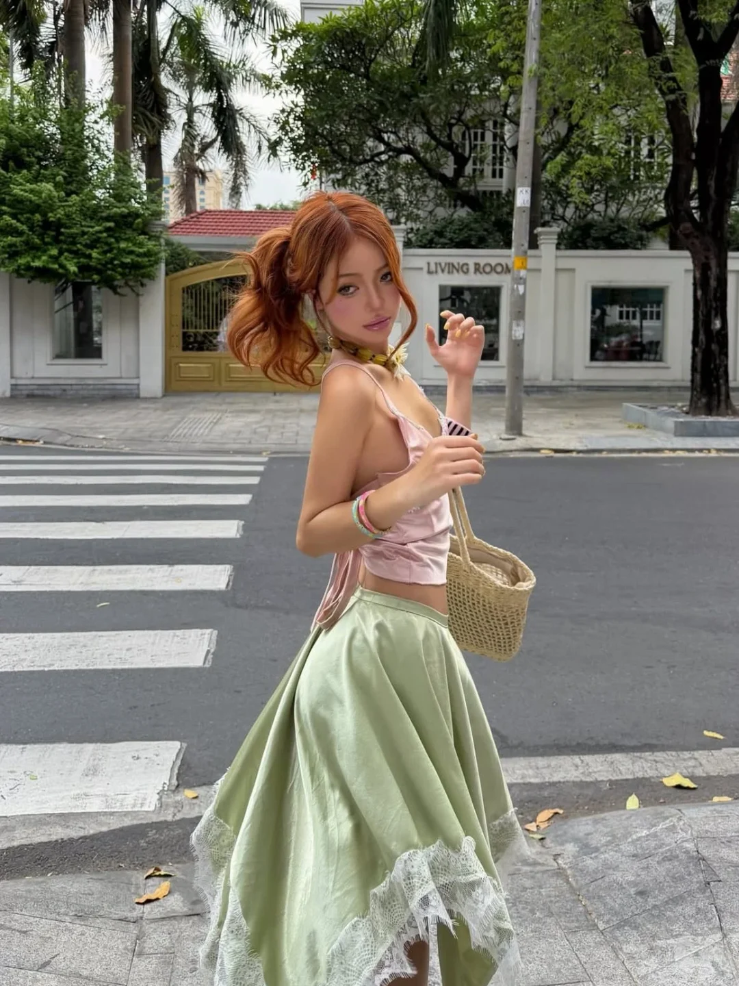 Photo 2 of Set crop top lụa hồng và chân váy midi xanh mint