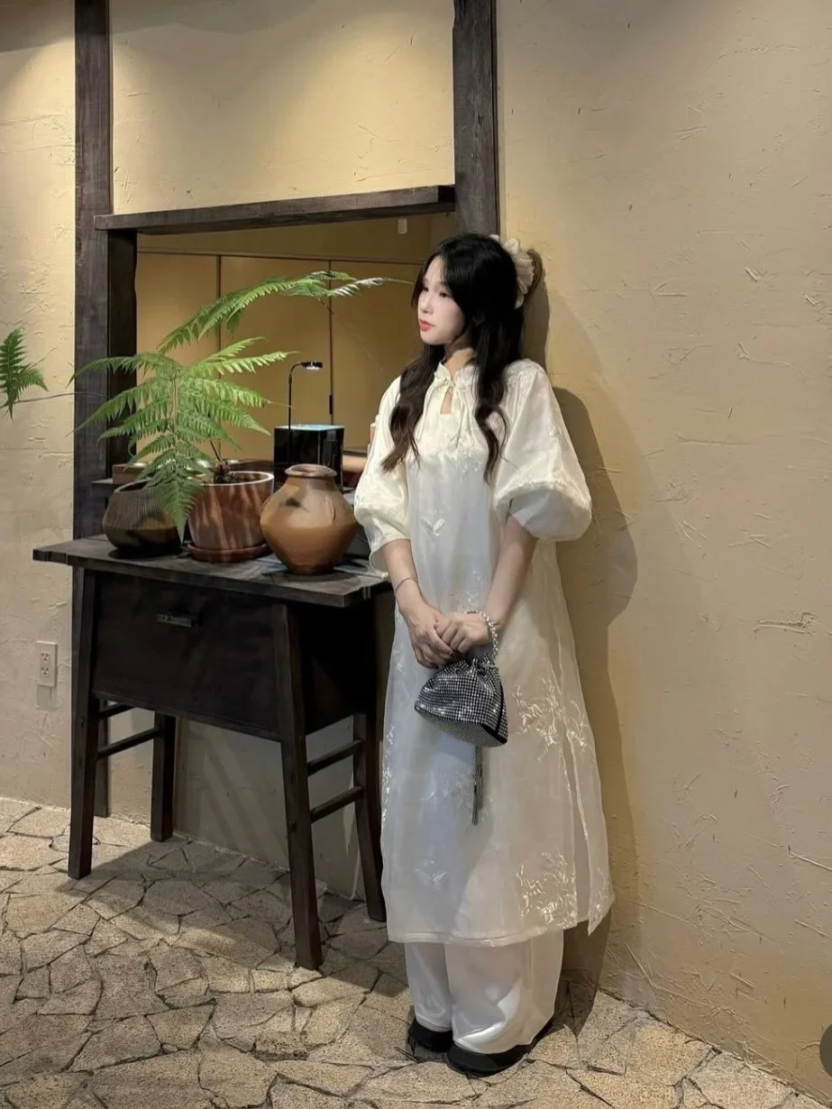 Ảnh 1 của Áo dài trắng thêu cách tân nữ