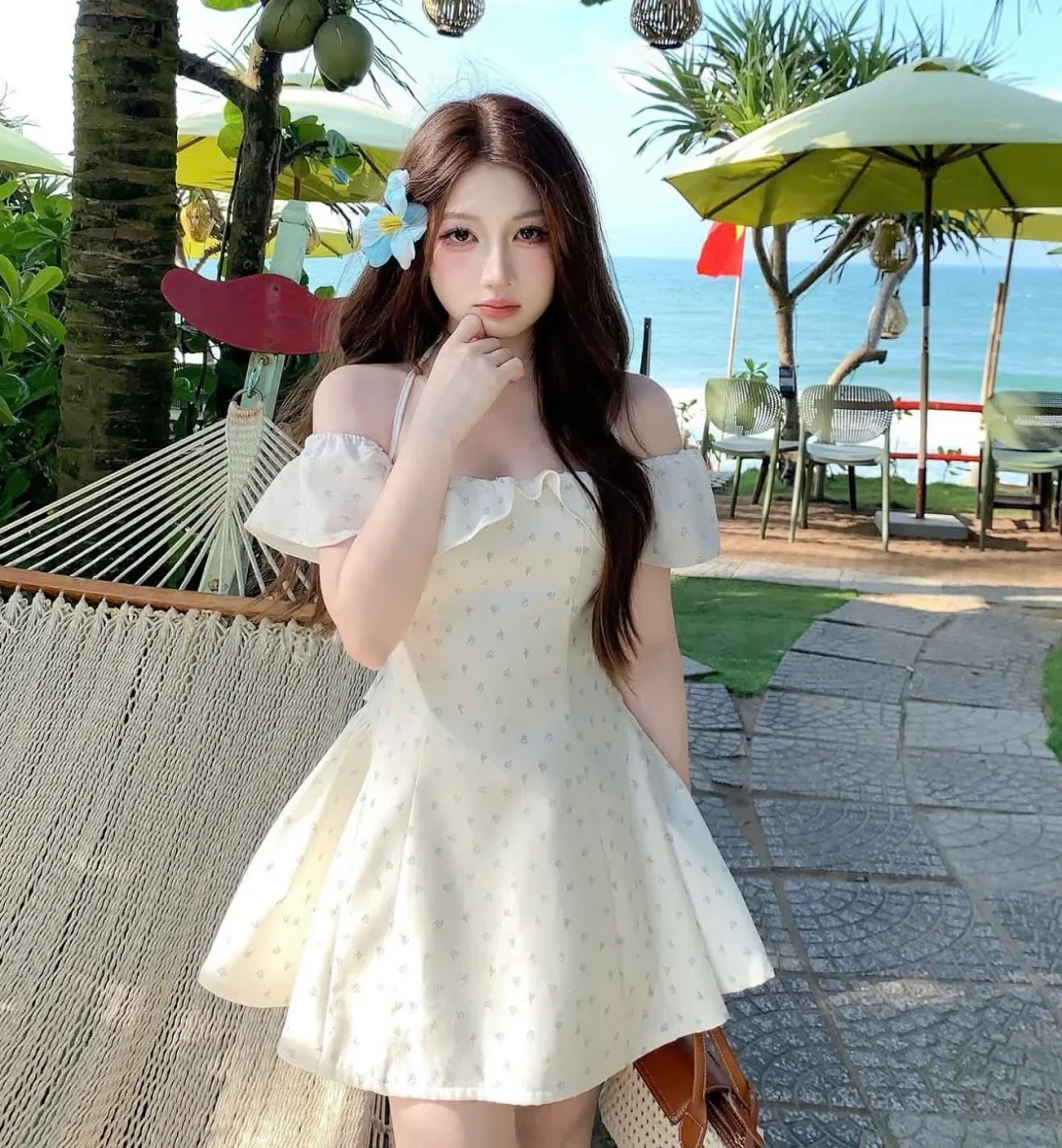 Photo 5 of Váy trắng trễ vai chấm bi nữ