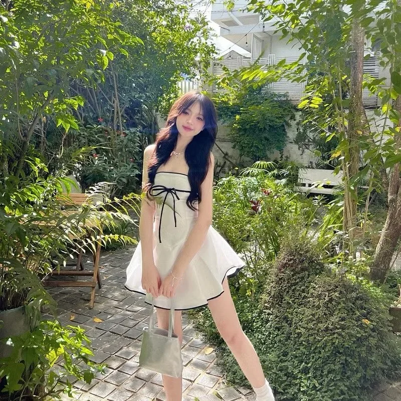 Ảnh 3 của Đầm trắng ngắn cột nơ đen nữ tính