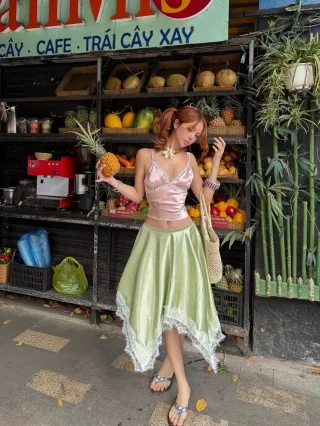 Photo 1 of Set crop top lụa hồng và chân váy midi xanh mint