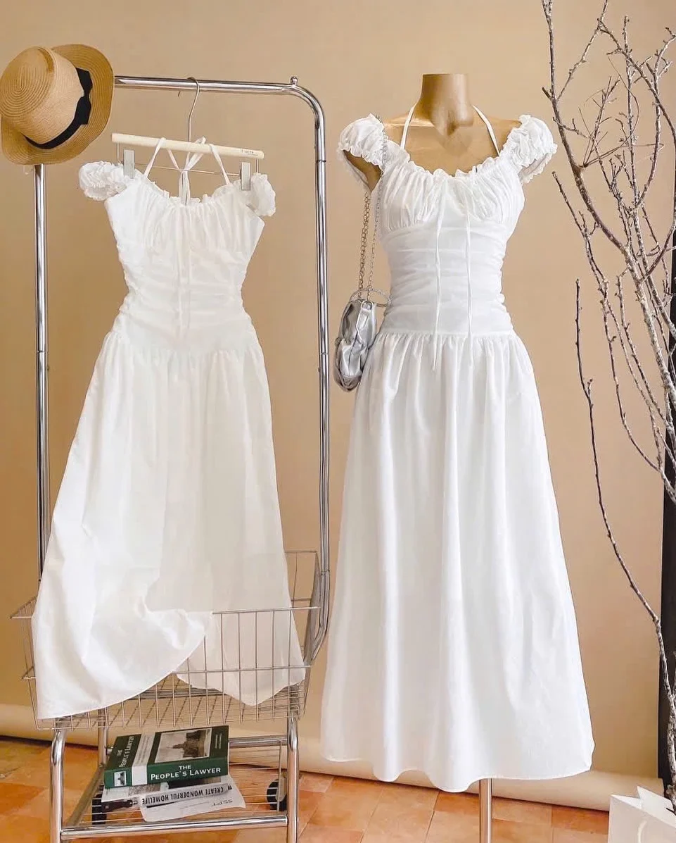Photo 7 of Váy maxi trắng trễ vai cột dây nữ