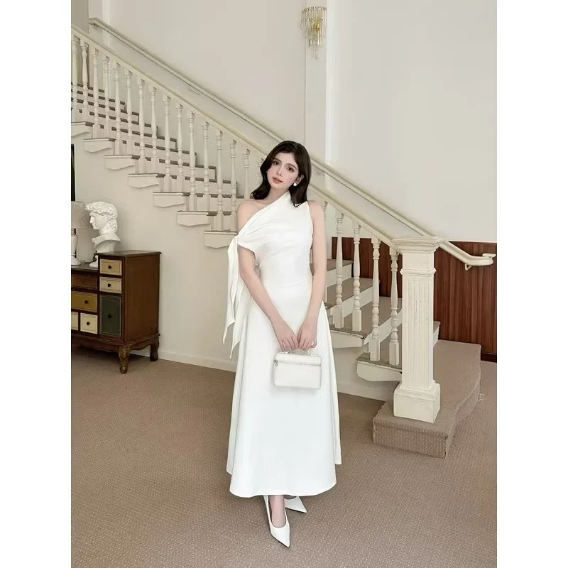 Ảnh 4 của Đầm maxi trắng nơ vai cho thuê
