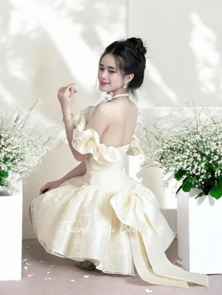 Ảnh 3 của Đầm ngắn ruffle vai nơ vàng nhạt nữ tính