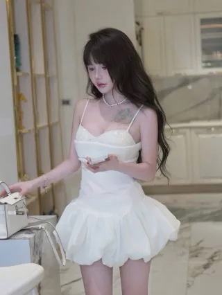 Photo 1 of Đầm trắng ngắn hai dây babydoll nữ