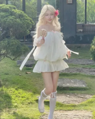 Photo 1 of Váy babydoll trắng nơ hồng nữ