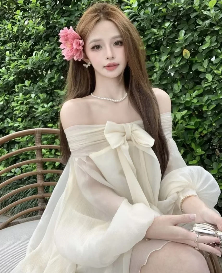 Ảnh 4 của Đầm trễ vai voan kem nơ to nữ