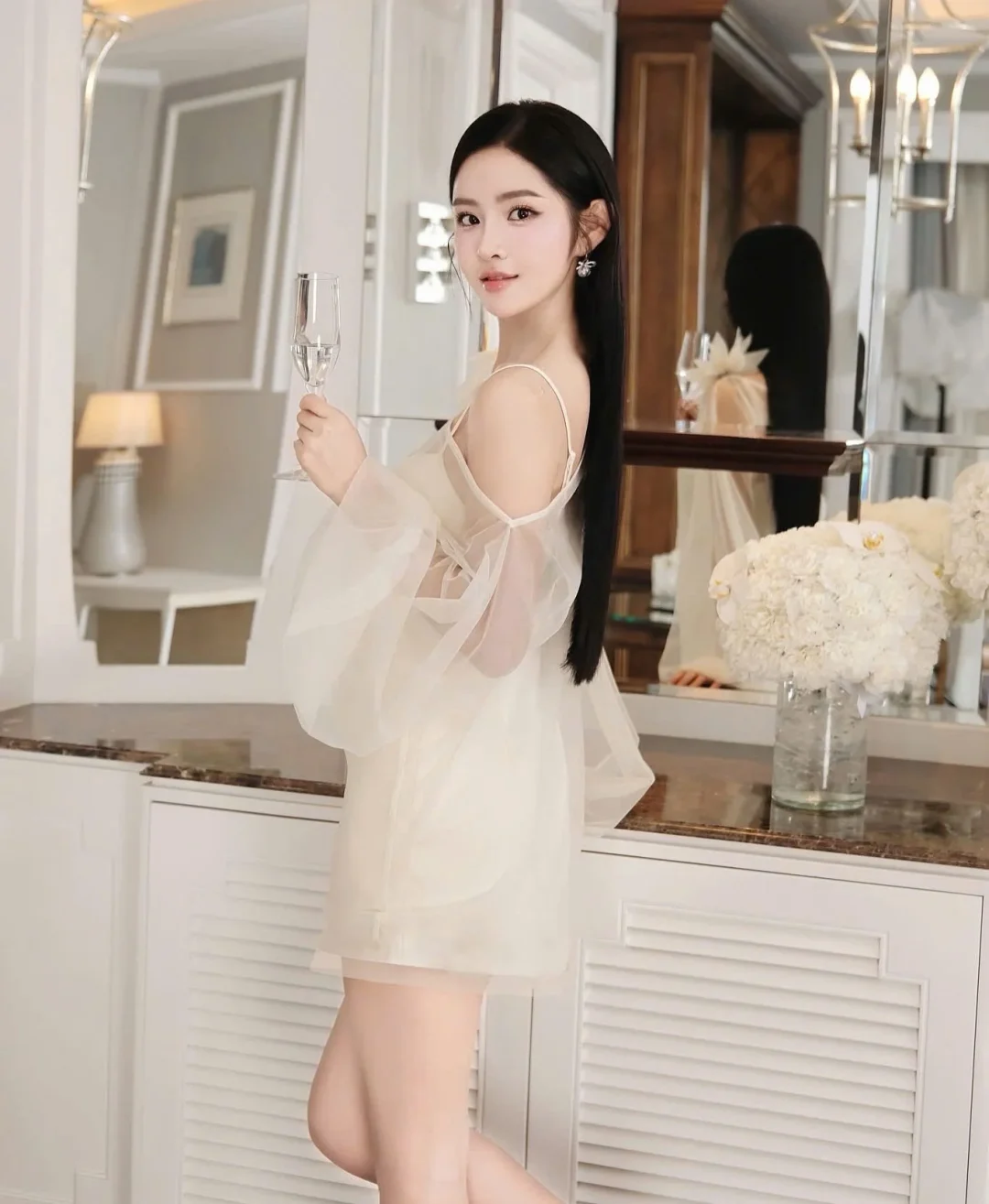 Ảnh 3 của Váy mini voan kem hở vai nữ