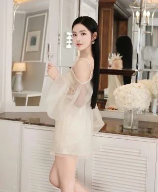 Ảnh 3 của Váy mini voan kem hở vai nữ