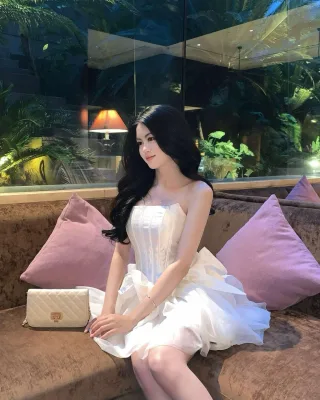 Ảnh 2 của Váy mini trắng corset nơ nữ