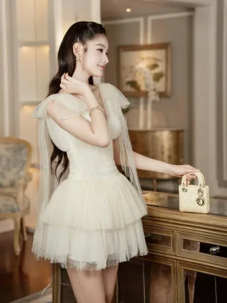 Photo 4 of Váy ngắn voan kem Chouchou tay cánh tiên