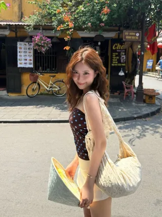 Photo 3 of Set áo quây chấm bi chân váy mini nữ