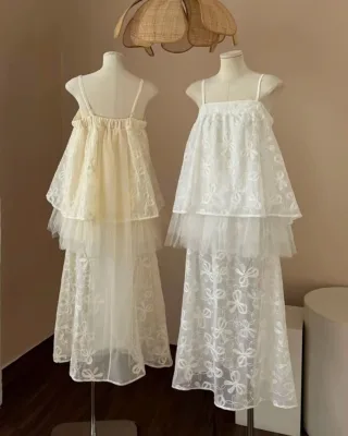 Photo 3 of Váy maxi ren trắng kem hai dây nữ