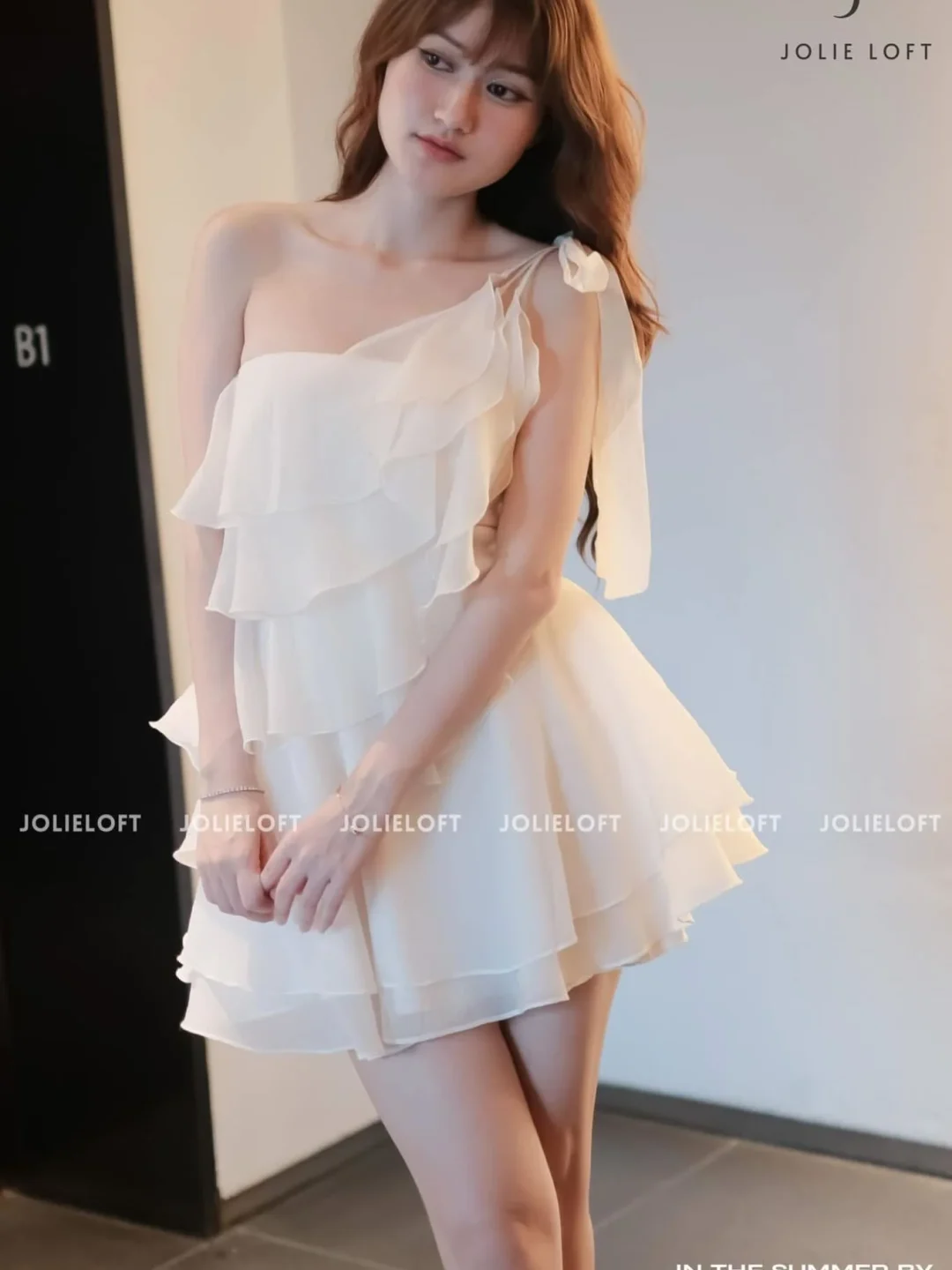 Ảnh 2 của Đầm mini trắng bèo nhún lệch vai