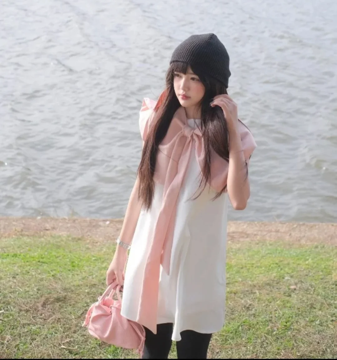 Photo 2 of Đầm trắng nơ hồng Nana Aguja size S M L