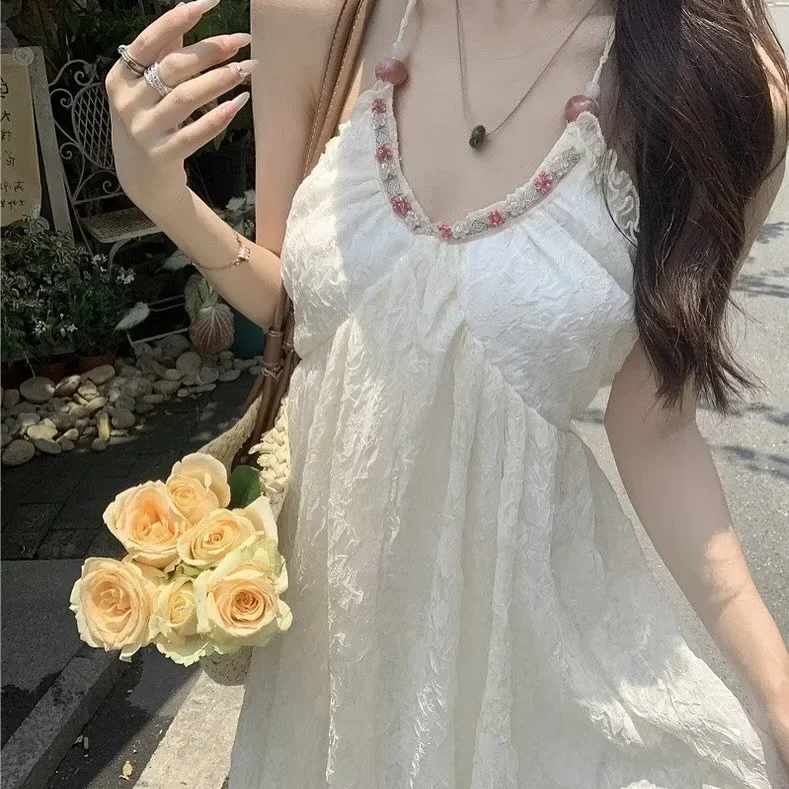 Photo 3 of Váy maxi trắng hai dây thêu ren nữ