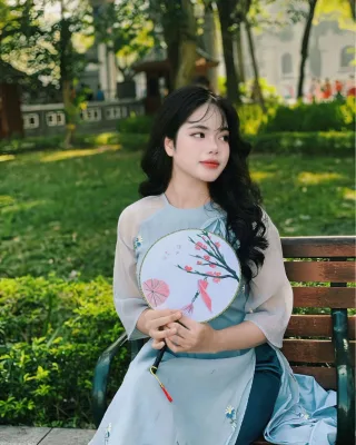 Ảnh 1 của Áo dài nữ xanh nhạt thêu hoa lụa