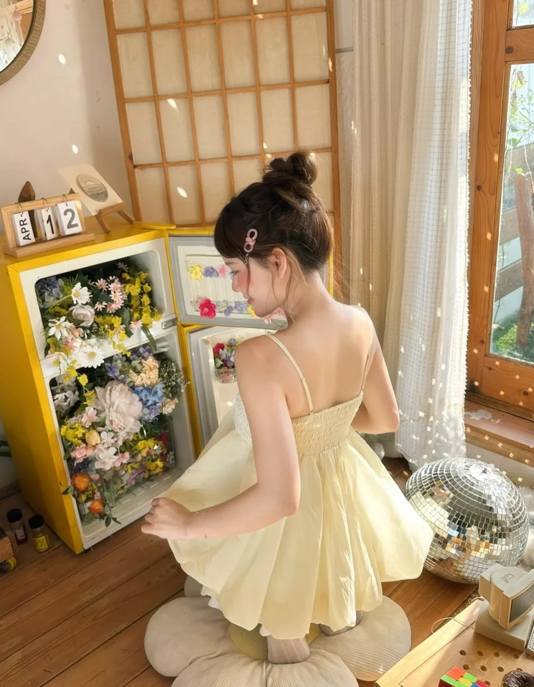 Photo 4 of Đầm babydoll voan vàng nhạt nữ tính
