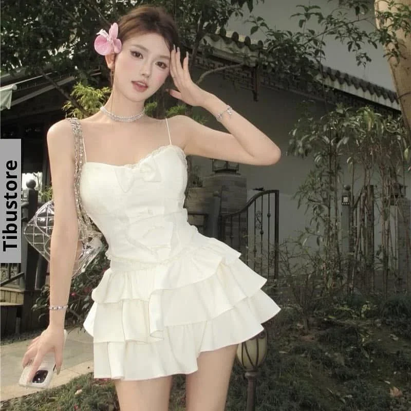 Photo 1 of Đầm mini trắng hai dây bèo nhún nữ