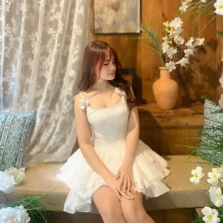 Photo 1 of Váy trắng ngắn hai dây bèo nhún nữ