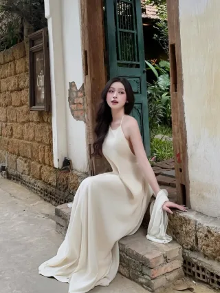 Ảnh 1 của Đầm maxi lụa kem hai dây nữ