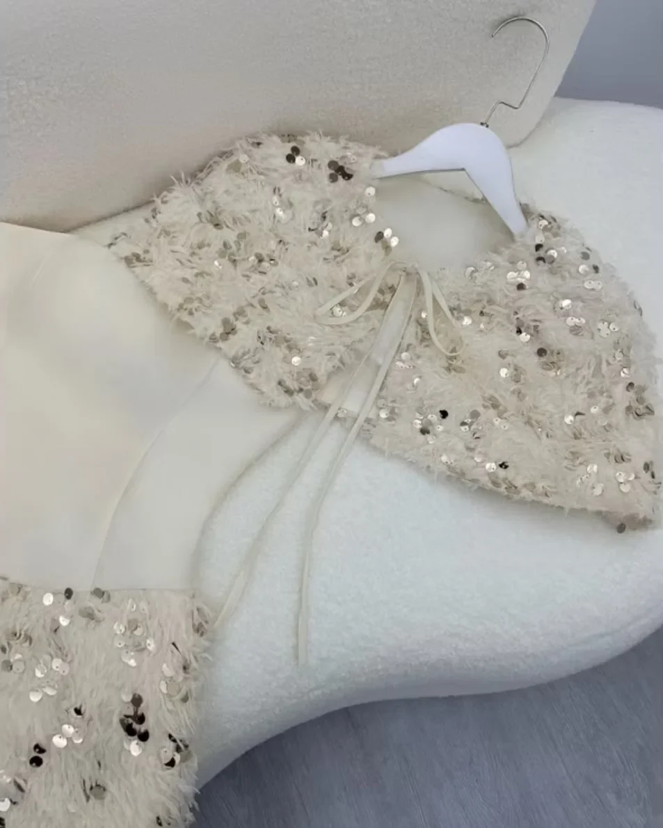 Photo 6 of Set váy corset lông vũ sequin trắng nữ