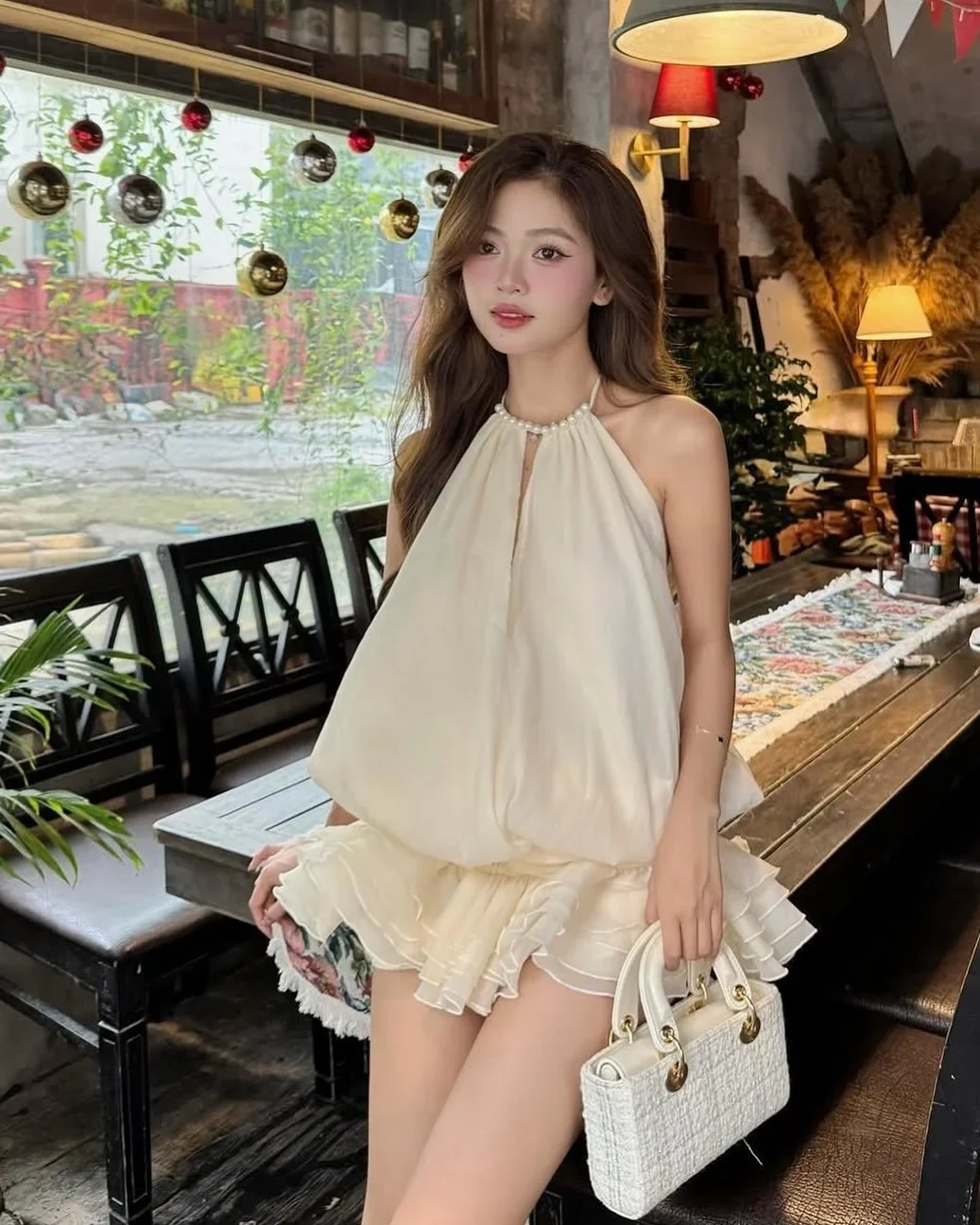 Photo 5 of Set áo yếm váy bèo nhún trắng kem nữ