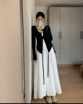 Photo 1 of Set cardigan đen chân váy maxi trắng size S