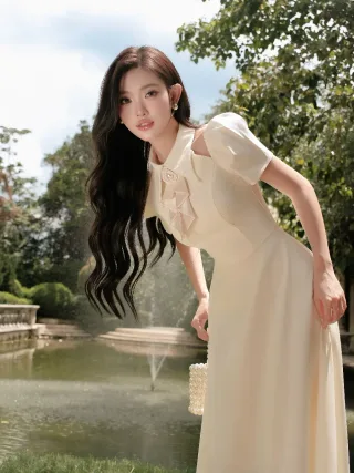 Photo 4 of Váy maxi lụa kem tay phồng nữ