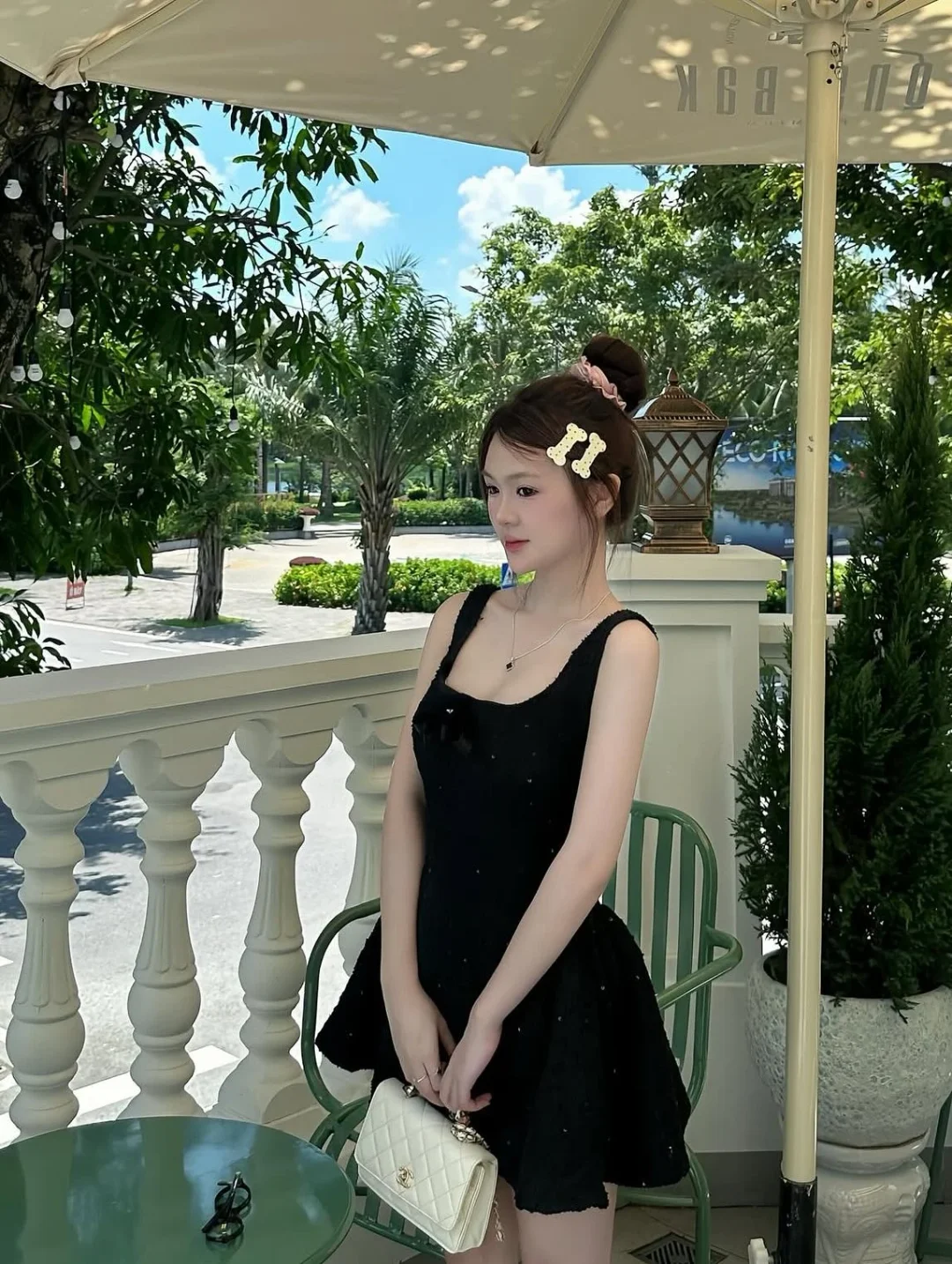 Photo 3 of Đầm mini đen nơ tweed nữ