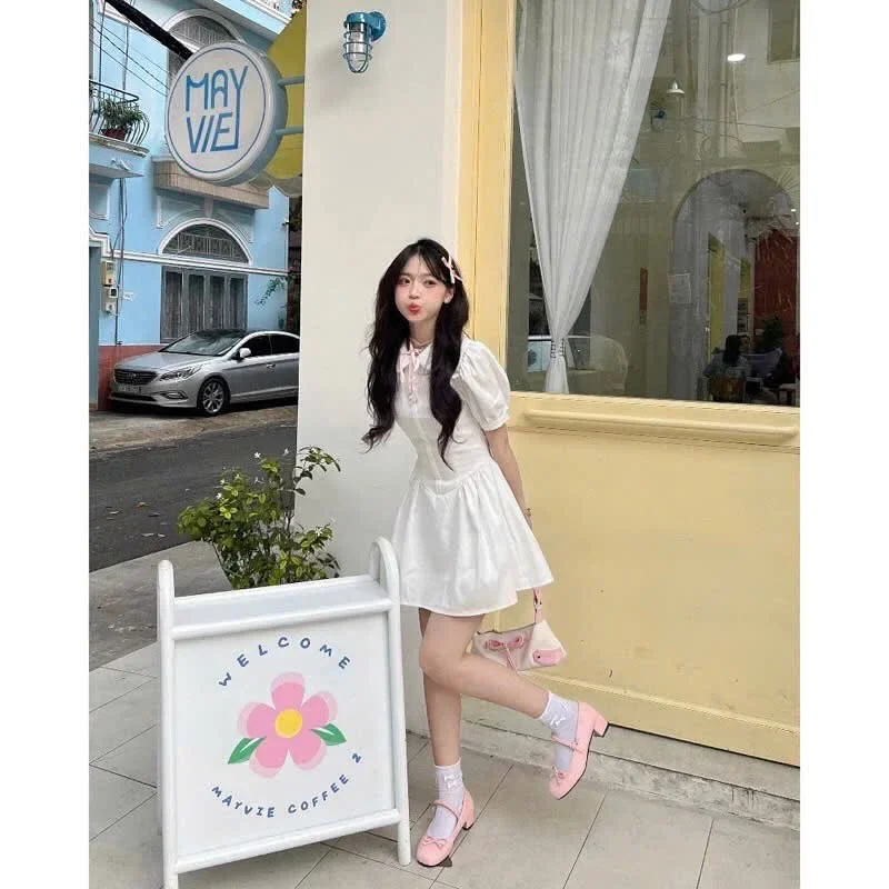 Ảnh 3 của Váy mini đen tay phồng nơ trắng nữ