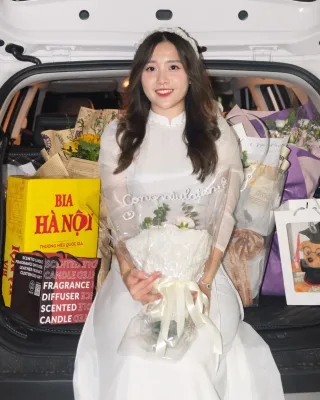 Photo 4 of Áo dài trắng voan nữ truyền thống