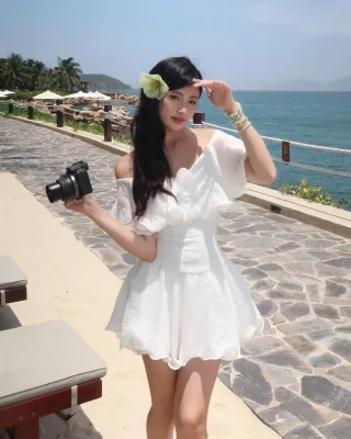 Photo 2 of Đầm trắng trễ vai bèo nhún size S M