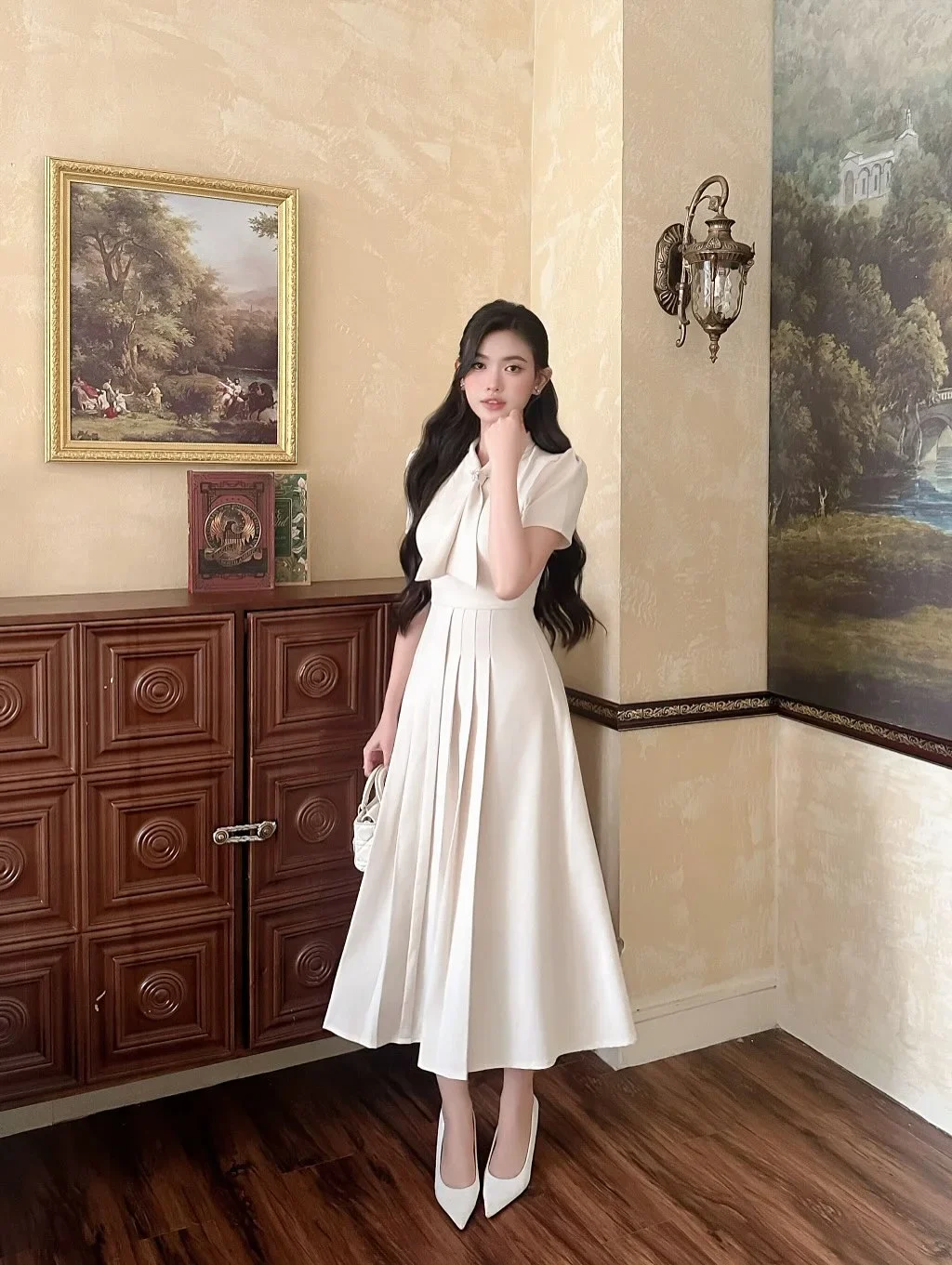 Ảnh 2 của Đầm midi kem cổ nơ cho thuê