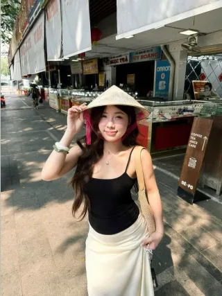 Photo 4 of Set áo hai dây đen chân váy trắng dài nữ