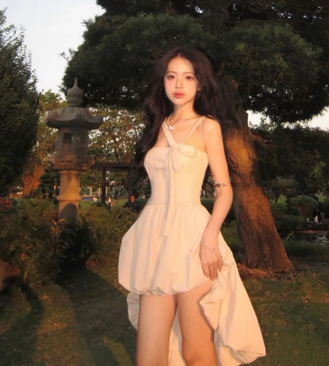 Ảnh 4 của Váy ngắn hai dây nơ kem Clélie size M