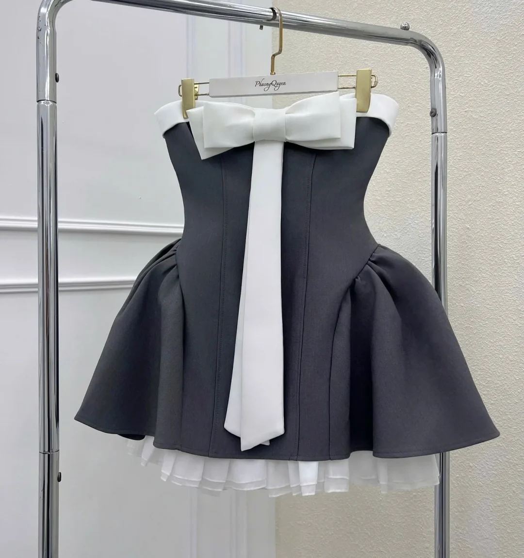 Photo 7 of Đầm xám nơ trắng búp bê size M