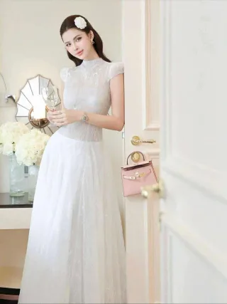 Photo 2 of Áo dài trắng ren nữ sang trọng