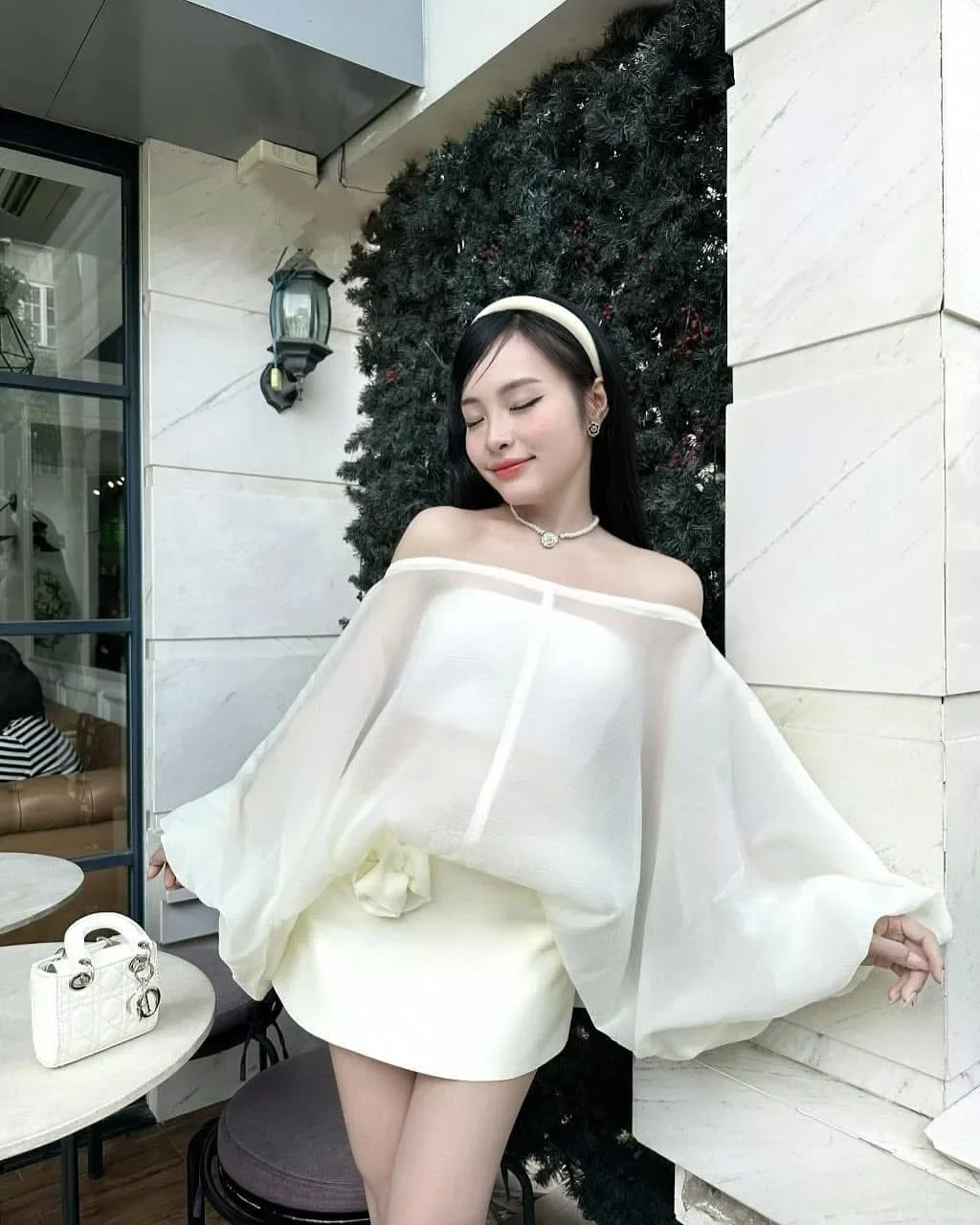Ảnh 4 của Set áo trễ vai váy mini trắng nữ