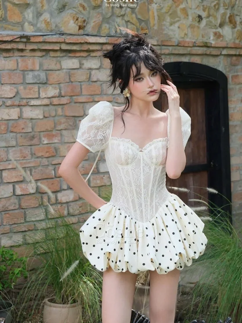 Photo 1 of Set áo corset ren và chân váy chấm bi nữ