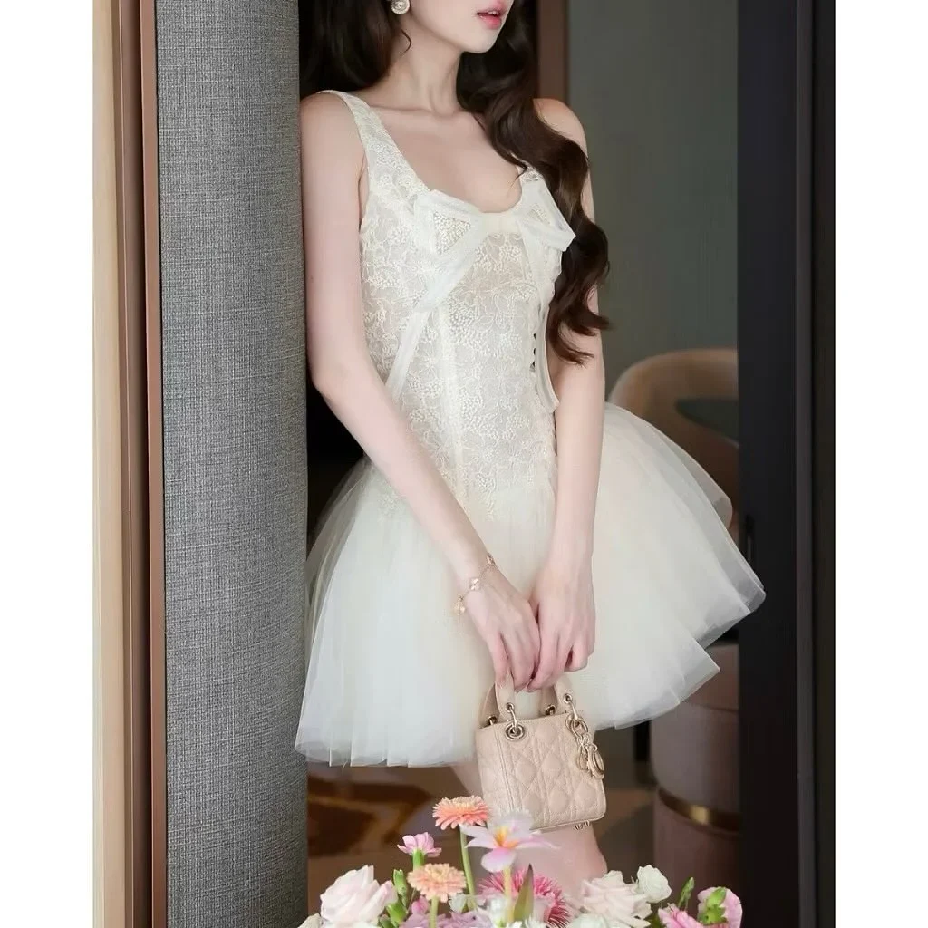 Photo 3 of Đầm ren tulle trắng ngắn nữ