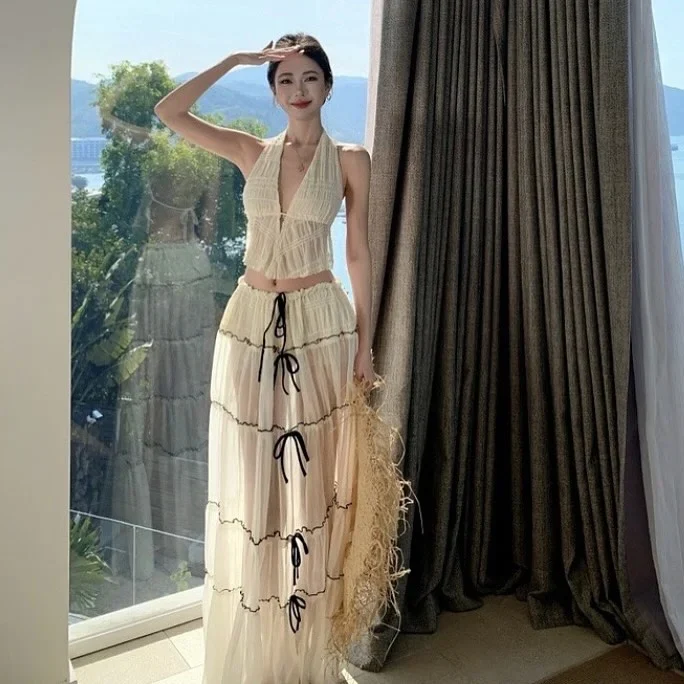 Photo 3 of Set Croptop Yếm Và Váy Maxi Voan Kem Nữ