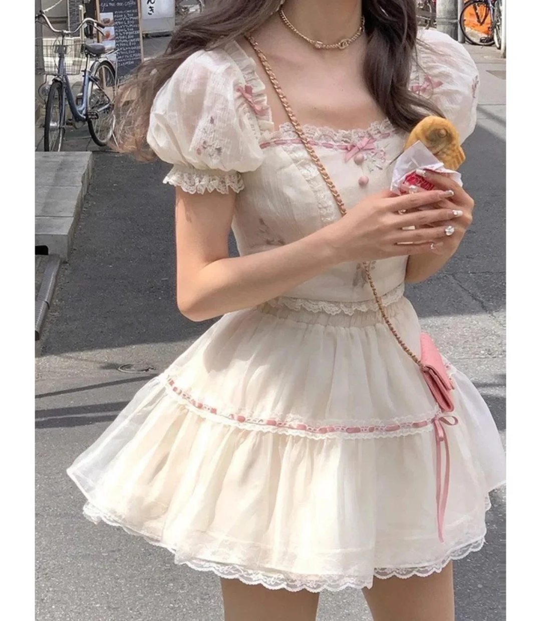 Photo 4 of Váy babydoll trắng hồng tay phồng size M