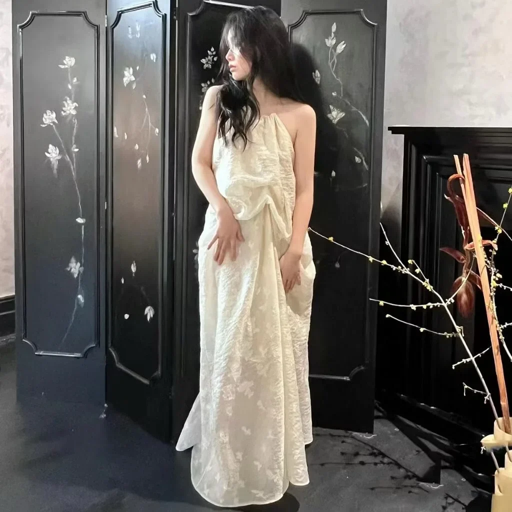 Ảnh 2 của Đầm maxi trắng hở lưng cho thuê