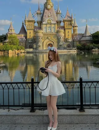 Photo 2 of Đầm trắng hai dây mini nữ tính